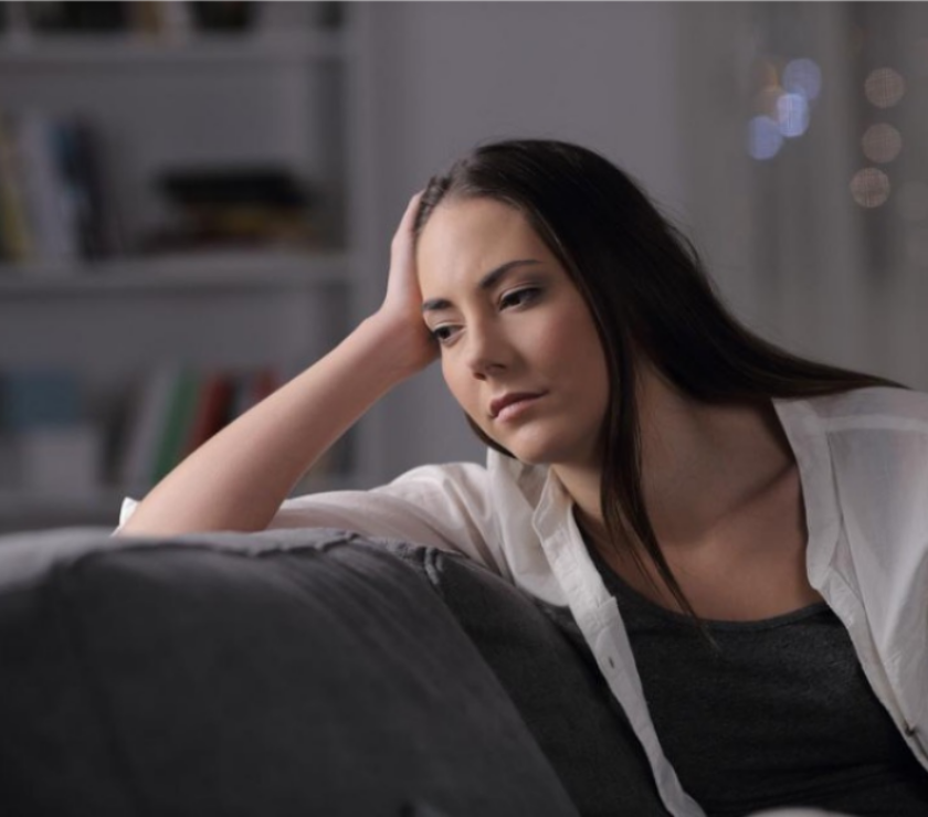 A person sitting on a couch AI-generated content may be incorrect